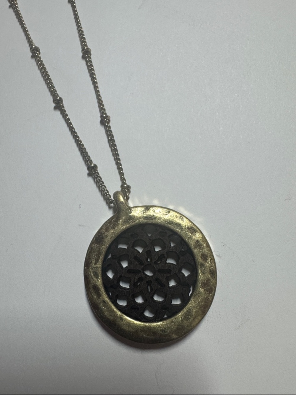 Round Filigree Pendant Necklace in Gold and brown wood -